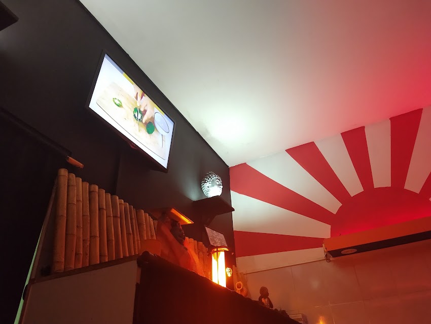 TAKUMA SUSHI & WOKS